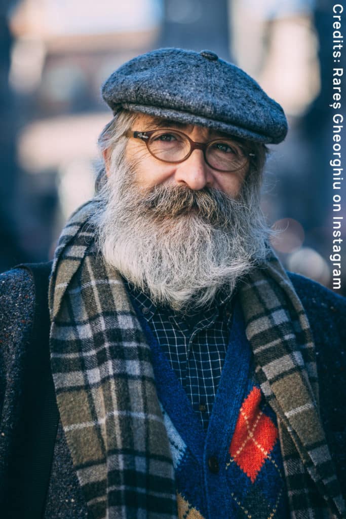 Old man wearing hat, standing in the street. It is a photo for the Instagram competition I am Europe.