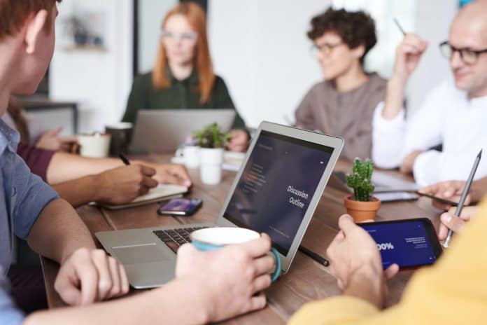 Group of people attending a meeting